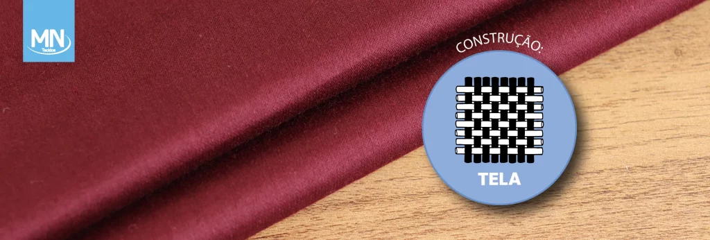 Imagem de tecido vinho com construção em tela, ilustrando o entrelaçamento uniforme de urdume e trama